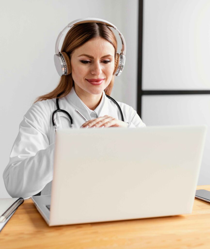 Physician using the 2C Health platform on a laptop